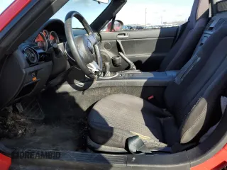 2006 Mazda MX-5 Miata Touring z VIN JM1NC25F360110572, wystawiony jako Copart lot #50555765 z przebiegiem 166 785 mil mil oraz Czysty tytuł • Clean title. Historia ofert i sprzedaży dostępna na DreamBid. Obrazek 7.
