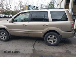 2006 Honda Pilot EX-L with VIN 2HKYF18516H528116, listed as a IAAI auction lot 41782324 with 245,280 mi miles and . Bid and sale history available at DreamBid. Image 14.
