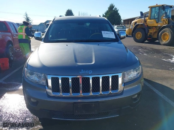 2013 Jeep Grand Cherokee Overland Summit with VIN 1C4RJFCT7DC585841, listed as a IAAI auction lot 41401170 with 122,719 mi miles. Bid and sale history available at carsss.com. Image 12.