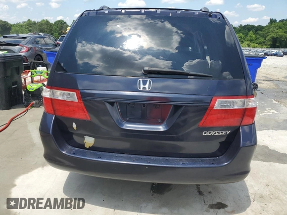 2005 Honda Odyssey EX-L z VIN 5FNRL38775B014777, wystawiony jako Copart lot #56245735 z przebiegiem 222 798 mil mil oraz Szkoda całkowita • Salvage title. Historia ofert i sprzedaży dostępna na DreamBid. Obrazek 6.
