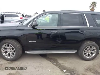 2015 GMC Yukon SLT with VIN 1GKS1BKC3FR129173, listed as a IAAI auction lot 41795585 with 97,893 mi miles. Bid and sale history available at carsss.com. Image 15.