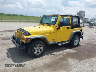 2004 Jeep Wrangler Sport z VIN 1J4FA49S04P701986, wystawiony jako IAAI lot #42256648 z przebiegiem 129 946 mil mil oraz . Historia ofert i sprzedaży dostępna na DreamBid. Obrazek 17.