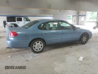 2007 Ford Taurus SE with VIN 1FAFP53U17A215432, listed as a Copart auction lot 64029215 with 121,190 mi miles and Salvage title. Bid and sale history available at DreamBid. Image 3.