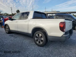 2019 Honda Ridgeline RTL-T with VIN 5FPYK2F63KB002874, listed as a Copart auction lot 42230235 with 127,158 mi miles and Non repairable. Bid and sale history available at DreamBid. Image 2.