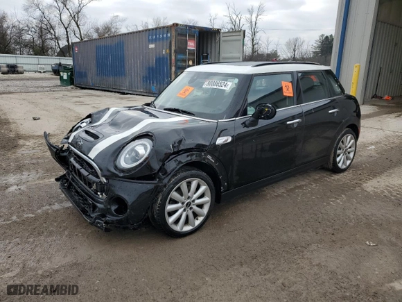 2021 MINI Hardtop 4 Door Cooper S with VIN WMWXU9C04M2M96933, listed as a Copart auction lot 80886524 with 60746 miles and Salvage Title. Bid and sale history available at carsss.com. Image 1.