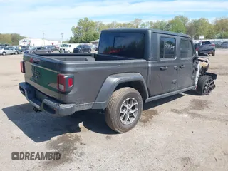 2024 Jeep Gladiator Willys with VIN 1C6HJTAG7RL109913, listed as a IAAI auction lot 41419209 with 6,581 mi miles and . Bid and sale history available at DreamBid. Image 4.