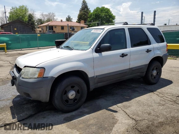 2004 Ford Escape XLS with VIN 1FMCU92114DA15564, listed as a Copart auction lot 59358015 with 186,135 mi miles and Salvage title. Bid and sale history available at DreamBid. Image 1.
