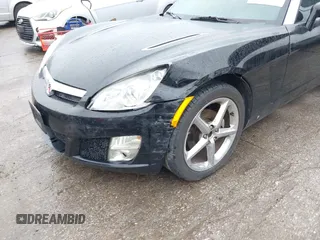 2009 Saturn Sky z VIN 1G8MN35B59Y104152, wystawiony jako IAAI lot #42308236 z przebiegiem 190 823 mil mil oraz . Historia ofert i sprzedaży dostępna na DreamBid. Obrazek 6.
