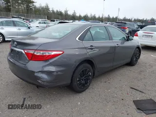 2016 Toyota Camry XLE with VIN 4T1BF1FK2GU127790, listed as a IAAI auction lot 41289837 with 151,636 mi miles and . Bid and sale history available at carsss.com. Image 4.