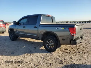 2013 Nissan Titan SV with VIN 1N6BA0EC3DN310724, listed as a Copart auction lot 84192004 with 165,959 mi miles and Salvage title. Bid and sale history available at DreamBid. Image 2.