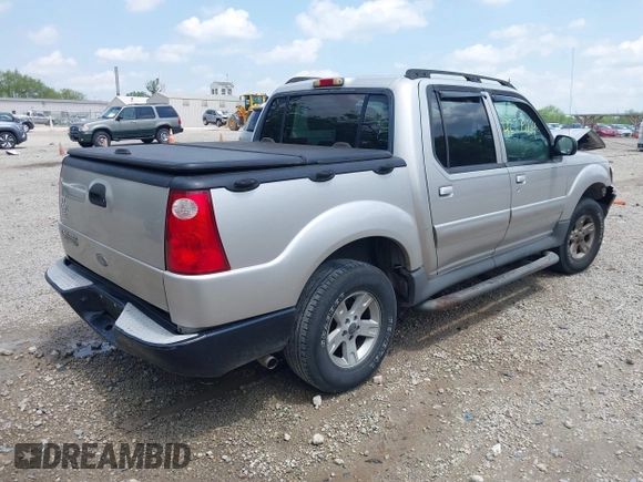 2005 Ford Explorer Sport Trac XLS z VIN 1FMZU77K55UB51889, wystawiony jako IAAI lot #42279164 z przebiegiem 210 081 mil mil oraz . Historia ofert i sprzedaży dostępna na DreamBid. Obrazek 4.