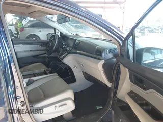 2019 Honda Odyssey EX-L z VIN 5FNRL6H74KB126773, wystawiony jako IAAI lot #41800523 z przebiegiem 46 982 mil mil oraz . Historia ofert i sprzedaży dostępna na DreamBid. Obrazek 5.