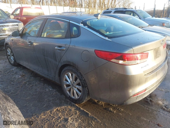 2016 Kia Optima LX with VIN 5XXGT4L39GG014281, listed as a IAAI auction lot 41367750 with 102,683 mi miles. Bid and sale history available at carsss.com. Image 3.