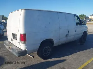 2011 Ford Econoline Cargo Commercial with VIN 1FTNE2EW8BDA84595, listed as a IAAI auction lot 41795228 with 316,856 mi miles. Bid and sale history available at carsss.com. Image 4.