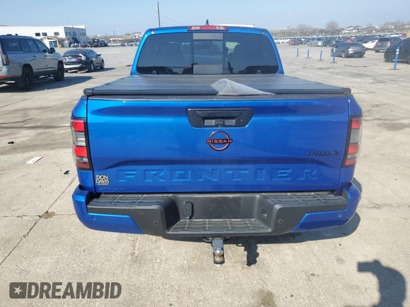 2024 Nissan Frontier Pro-X z VIN 1N6ED1EJ2RN646428, wystawiony jako Copart lot #44304215 z przebiegiem 5 853 mil mil oraz Szkoda całkowita • Salvage title. Historia ofert i sprzedaży dostępna na DreamBid. Obrazek 6.