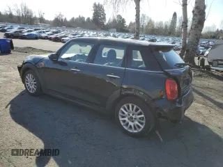 2016 MINI Hardtop 4 Door with VIN WMWXU1C57G2E16741, listed as a Copart auction lot 48392355 with 72,662 mi miles and Salvage Title. Bid and sale history available at DreamBid. Image 2.