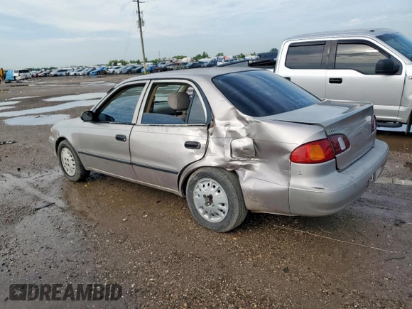 1999 Toyota Corolla VE z VIN 1NXBR12E0XZ215258, wystawiony jako Copart lot #60704095 z przebiegiem Nie podano mil oraz Szkoda całkowita • Salvage title. Historia ofert i sprzedaży dostępna na DreamBid. Obrazek 2.