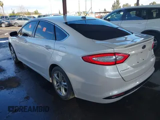 2016 Ford Fusion Titanium Hybrid with VIN 3FA6P0RU1GR191813, listed as a IAAI auction lot 41560954 with 86,922 mi miles. Bid and sale history available at carsss.com. Image 3.