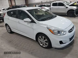 2014 Hyundai Accent SE with VIN KMHCU5AE4EU163402, listed as a IAAI auction lot 41755872 with 161,017 mi miles. Bid and sale history available at carsss.com. Image 1.