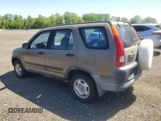 2002 Honda CR-V LX with VIN JHLRD684X2C007953, listed as a Copart auction lot 54904815 with 214,150 mi miles and Clean Title. Bid and sale history available at carsss.com. Image 2.