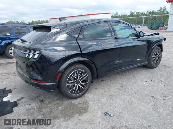 2024 Ford Mustang Mach-E Premium z VIN 3FMTK3R72RMA42779, wystawiony jako IAAI lot #42099121 z przebiegiem 1 791 mil mil oraz . Historia ofert i sprzedaży dostępna na DreamBid. Obrazek 4.