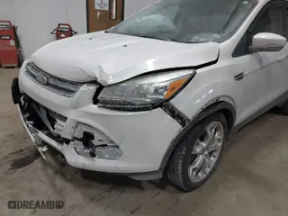 2016 Ford Escape Titanium with VIN 1FMCU9J9XGUC35958, listed as a IAAI auction lot 41389177 with 148,655 mi miles. Bid and sale history available at carsss.com. Image 6.