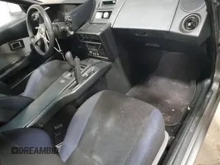 1989 Toyota MR2 z VIN JT2AW15C1K0150268, wystawiony jako Copart lot #86257134 z przebiegiem 93 969 mil mil oraz Tytuł czysty. Historia ofert i sprzedaży dostępna na DreamBid. Obrazek 8.