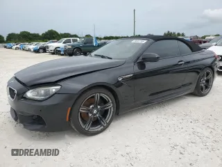 2012 BMW M6 z VIN WBSLZ9C50CC985653, wystawiony jako Copart lot #59567755 z przebiegiem 36 711 mil mil oraz Czysty tytuł • Clean title. Historia ofert i sprzedaży dostępna na DreamBid. Obrazek 1.