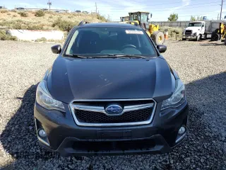 2016 Subaru Crosstrek Premium with VIN JF2GPABC9G8239065, listed as a Copart auction lot 62390795 with 96,400 mi miles and Salvage title. Bid and sale history available at DreamBid. Image 5.