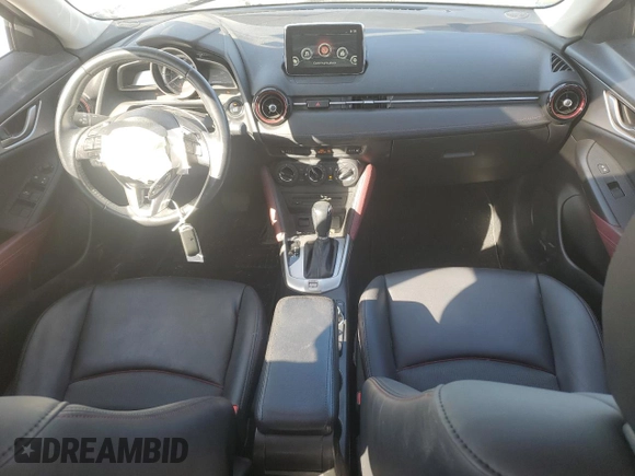 2017 Mazda CX-3 Touring z VIN JM1DKDC75H0170331, wystawiony jako Copart lot #51997455 z przebiegiem 141 405 mil mil oraz Szkoda całkowita • Salvage title. Historia ofert i sprzedaży dostępna na DreamBid. Obrazek 8.