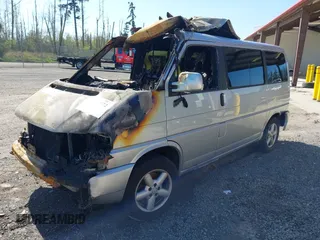 2003 Volkswagen EuroVan MV with VIN WV2MB47073H043489, listed as a IAAI auction lot 42030772 with Not Provided miles and . Bid and sale history available at DreamBid. Image 2.