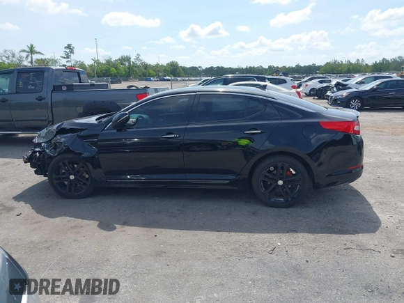 2013 Kia Optima SX with VIN 5XXGR4A61DG100479, listed as a IAAI auction lot 42376261 with 201,615 mi miles and . Bid and sale history available at DreamBid. Image 14.