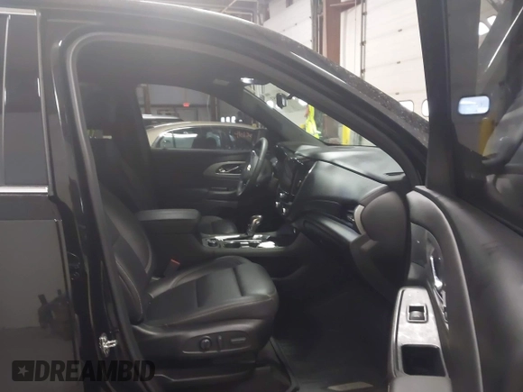 2022 Chevrolet Traverse LT with VIN 1GNEVHKW3NJ124361, listed as a IAAI auction lot 41033053 with 27,869 mi miles and . Bid and sale history available at DreamBid. Image 5.