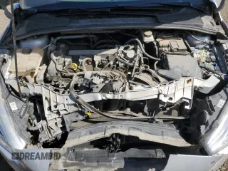 2017 Ford Focus SE z VIN 1FADP3F24HL308294, wystawiony jako Copart lot #56516265 z przebiegiem 80 431 mil mil oraz Szkoda całkowita • Salvage title. Historia ofert i sprzedaży dostępna na DreamBid. Obrazek 11.