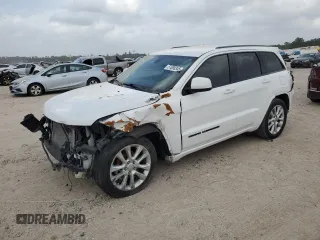 2018 Jeep Grand Cherokee Laredo E with VIN 1C4RJEAG3JC168390, listed as a Copart auction lot 51808345 with 111,974 mi miles and Salvage title. Bid and sale history available at DreamBid. Image 1.