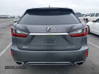 2016 Lexus RX 350 with VIN 2T2BZMCA7GC038203, listed as a IAAI auction lot 42106270 with 117,085 mi miles and . Bid and sale history available at DreamBid. Image 16.