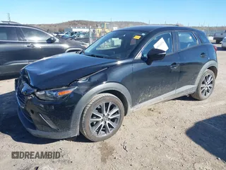 2018 Mazda CX-3 Touring with VIN JM1DKDC70J0325325, listed as a IAAI auction lot 40914334 with 63,978 mi miles. Bid and sale history available at carsss.com. Image 2.