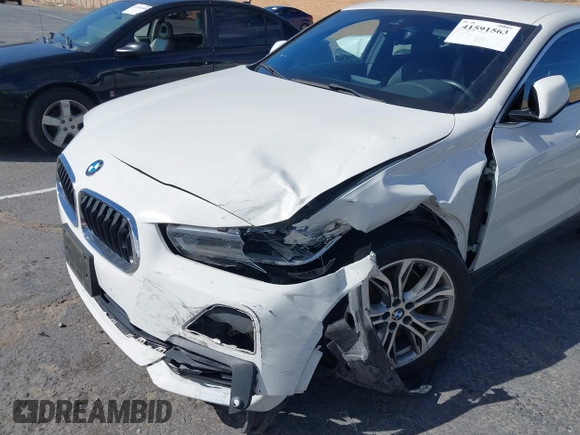 2020 BMW X2 sDrive28i with VIN WBXYH9C01L5P01913, listed as a IAAI auction lot 41591563 with 65,271 mi miles. Bid and sale history available at carsss.com. Image 6.