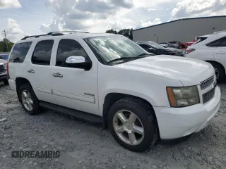 2011 Chevrolet Tahoe LS with VIN 1GNSCAE08BR394917, listed as a Copart auction lot 60470395 with 143,824 mi miles and Salvage title. Bid and sale history available at DreamBid. Image 4.