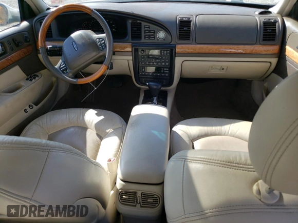 2002 Lincoln Continental with VIN 1LNHM97V62Y643532, listed as a Copart auction lot 76015984 with 154,374 mi miles and Salvage Title. Bid and sale history available at carsss.com. Image 8.