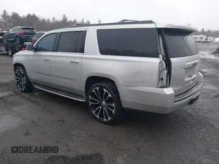 2015 GMC Yukon XL SLT with VIN 1GKS2HKC0FR287860, listed as a IAAI auction lot 41638921 with 213,214 mi miles. Bid and sale history available at carsss.com. Image 3.