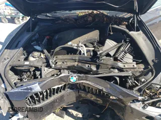 2015 BMW 5 Series 528i xDrive with VIN WBA5A7C55FD620599, listed as a Copart auction lot 74997904 with 119,474 mi miles and Salvage title. Bid and sale history available at DreamBid. Image 12.