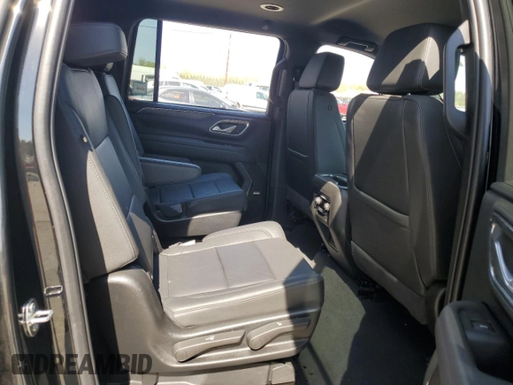 2024 Chevrolet Suburban Z71 z VIN 1GNSKDKD1RR116799, wystawiony jako Copart lot #53435185 z przebiegiem 23 697 mil mil oraz Szkoda całkowita • Salvage title. Historia ofert i sprzedaży dostępna na DreamBid. Obrazek 11.