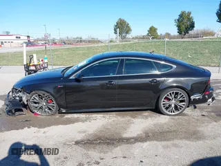 2016 Audi A7 Prestige z VIN WAU2GAFC5GN169534, wystawiony jako IAAI lot #40802384 z przebiegiem 103 263 mil mil oraz . Historia ofert i sprzedaży dostępna na DreamBid. Obrazek 14.