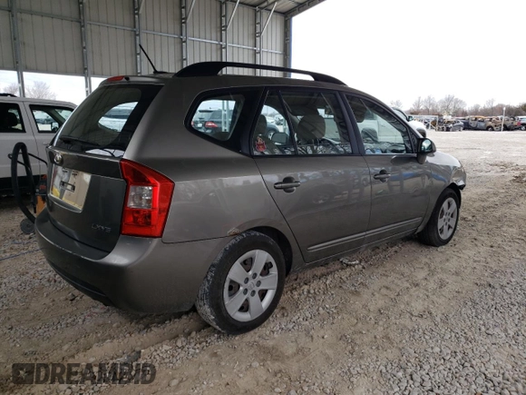 2009 Kia Rondo LX with VIN KNAFG526297252855, listed as a Copart auction lot 84956504 with 83,351 mi miles and Salvage Title. Bid and sale history available at carsss.com. Image 3.