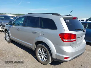 2014 Dodge Journey SXT with VIN 3C4PDCBG8ET118998, listed as a IAAI auction lot 42177885 with 165,247 mi miles. Bid and sale history available at carsss.com. Image 3.