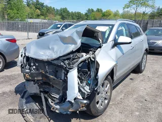 2016 Cadillac SRX Luxury Collection with VIN 3GYFNEE37GS559537, listed as a IAAI auction lot 42246889 with 102,261 mi miles and . Bid and sale history available at DreamBid. Image 2.
