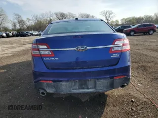 2014 Ford Taurus SEL z VIN 1FAHP2E88EG174797, wystawiony jako Copart lot #53961615 z przebiegiem Nie podano mil oraz Szkody całkowita. Historia ofert i sprzedaży dostępna na DreamBid. Obrazek 6.