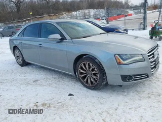 2012 Audi A8 L with VIN WAURVAFD8CN017206, listed as a IAAI auction lot 41626707 with 138,922 mi miles. Bid and sale history available at carsss.com. Image 1.