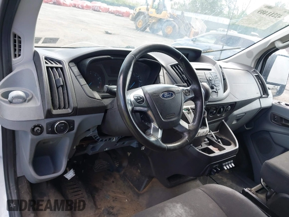 2016 Ford Transit Cargo z VIN 1FTYR1YM0GKB55605, wystawiony jako IAAI lot #42211489 z przebiegiem Nie podano mil oraz . Historia ofert i sprzedaży dostępna na DreamBid. Obrazek 18.